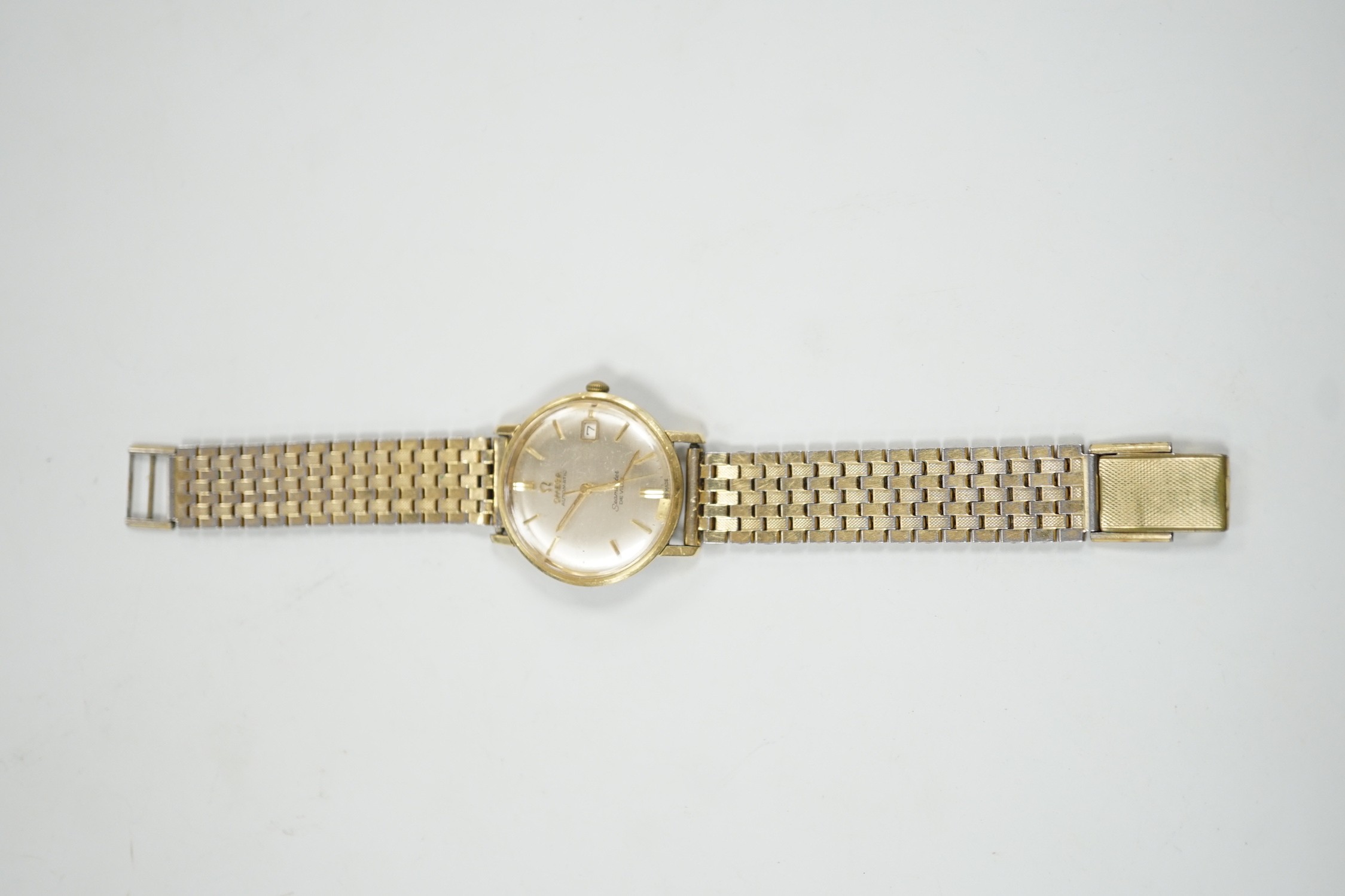 A gentleman's 1950's steel and gold plated Omega Seamaster De Ville automatic wrist watch (a.f.), movement c.355, case diameter 35mm, on associated bracelet.